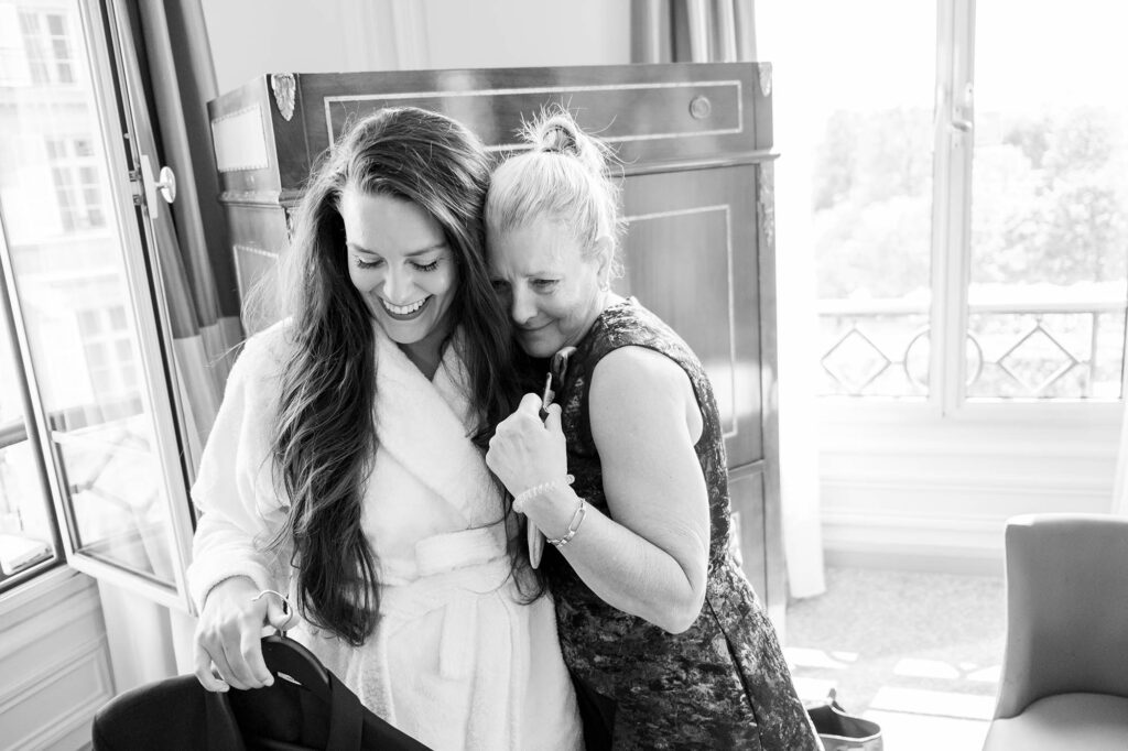 mother of the bride sharing a moment with her daughter on her wedding day