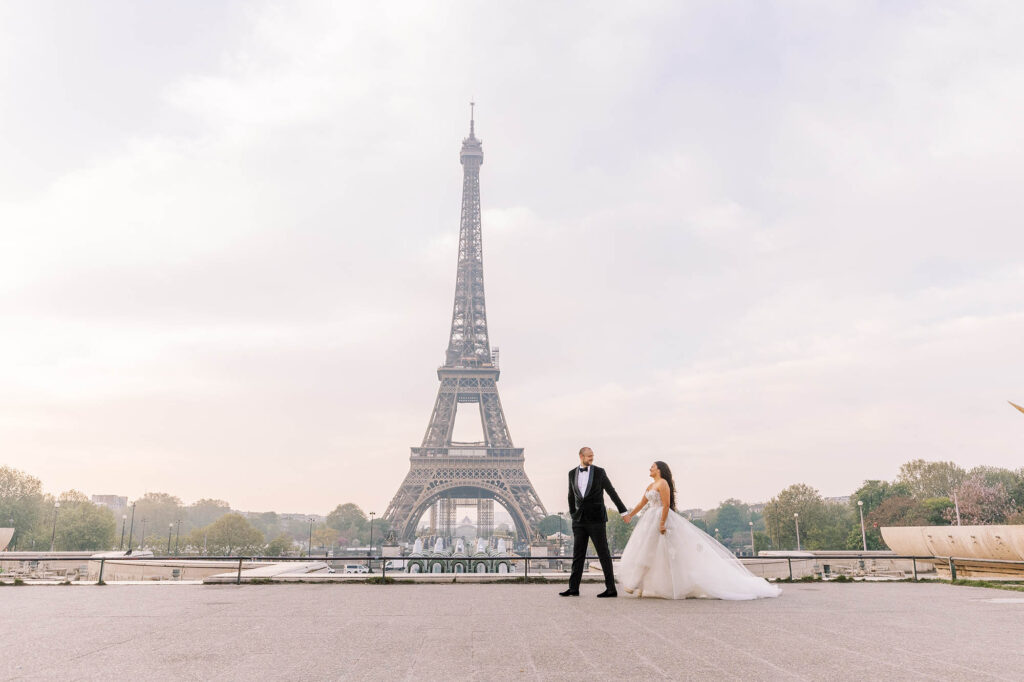 bride and groom portrait in front of the Eiffel Tower in Paris