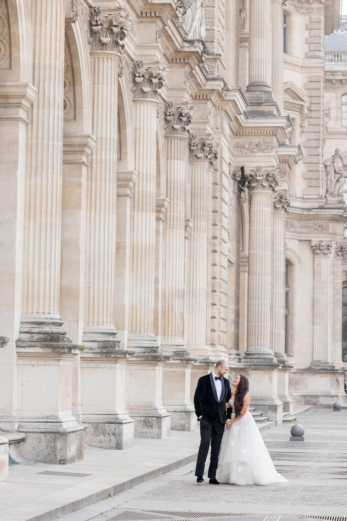 Bride and groom eloping at the Louvre Museum in Paris